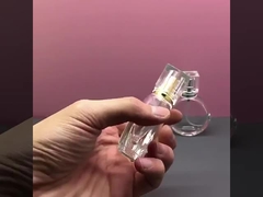 Glass perfume bottle 25ML flat round portable perfume bottle